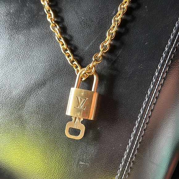 Authentic Louis Vuitton lock necklace —purchased for $280. NWT - Picture 4 of 8